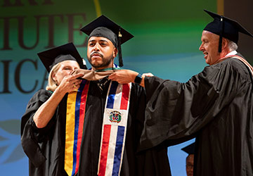 Student at his Culinary Institute of America graduation.