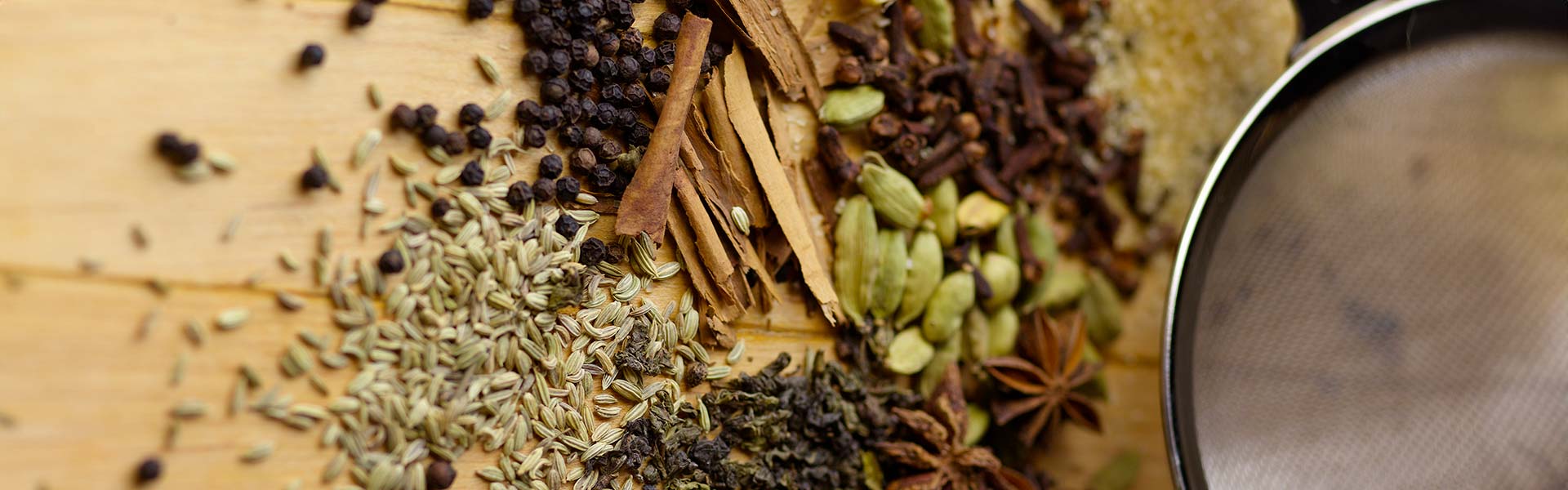 Chai spices include cardamom, ginger, star anise, cinnamon, fennel, and peppercorns.