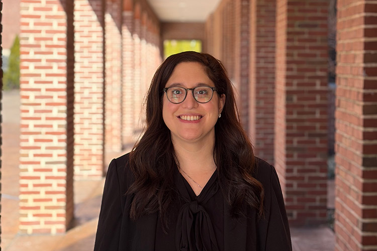 Graduate Admissions Counselor Rebecca Rein Helps Master’s Students Image of a smiling CIA graduate admissions staff member.